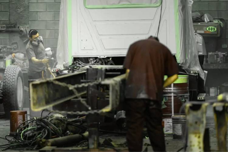 Image showing our experts modifying chassis of heavy vehicle for VASS certificate